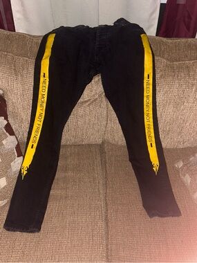Black Skinny Jeans with Yellow Side Stripe Graphic